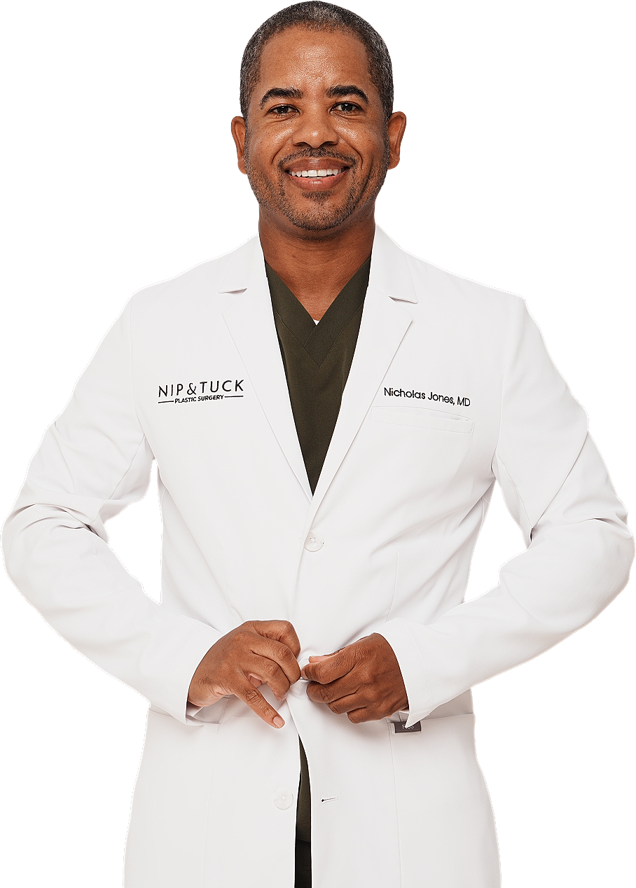 Dr. Nicholas Jones in white coat plastic surgeon Atlanta